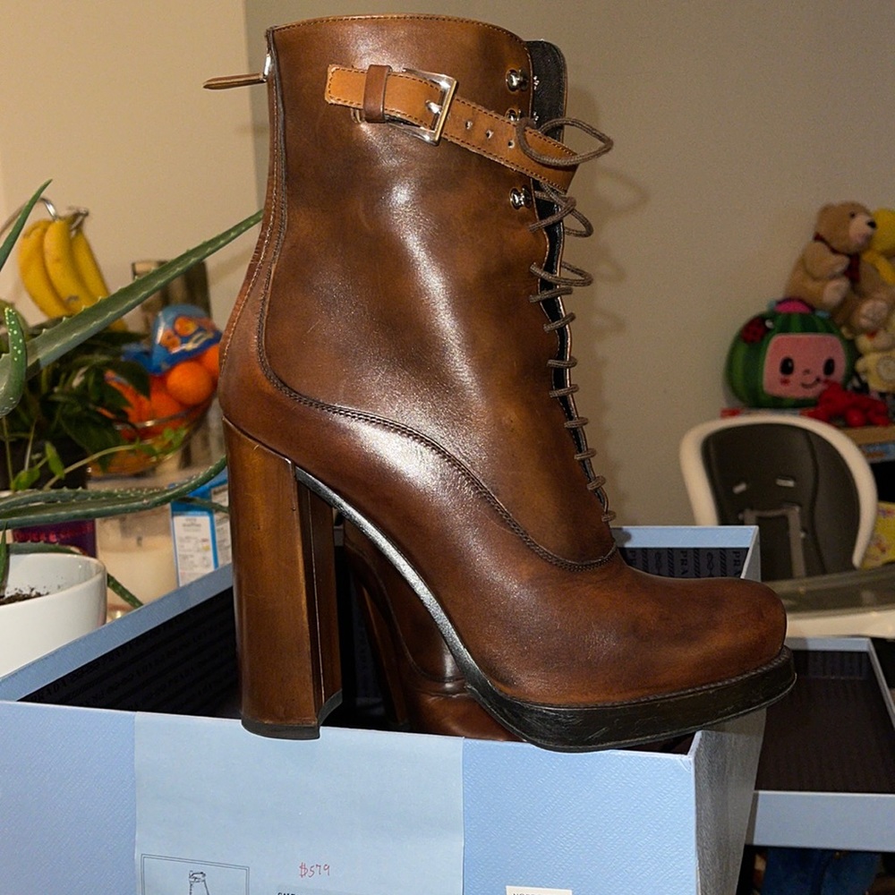Beautiful ankle bootie. Texturized leather. High heel you must be able to WALK!